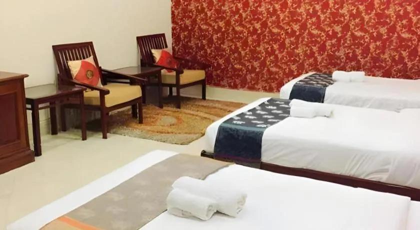 Bed in New Rose Boutique Hotel