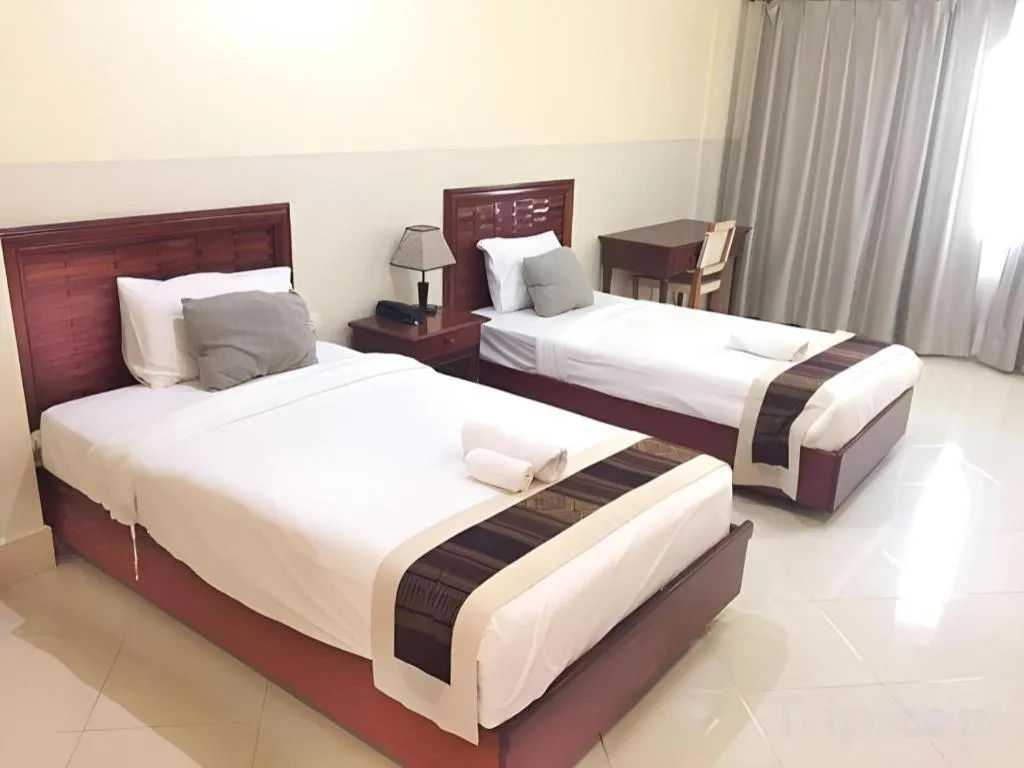 Bed in New Rose Boutique Hotel