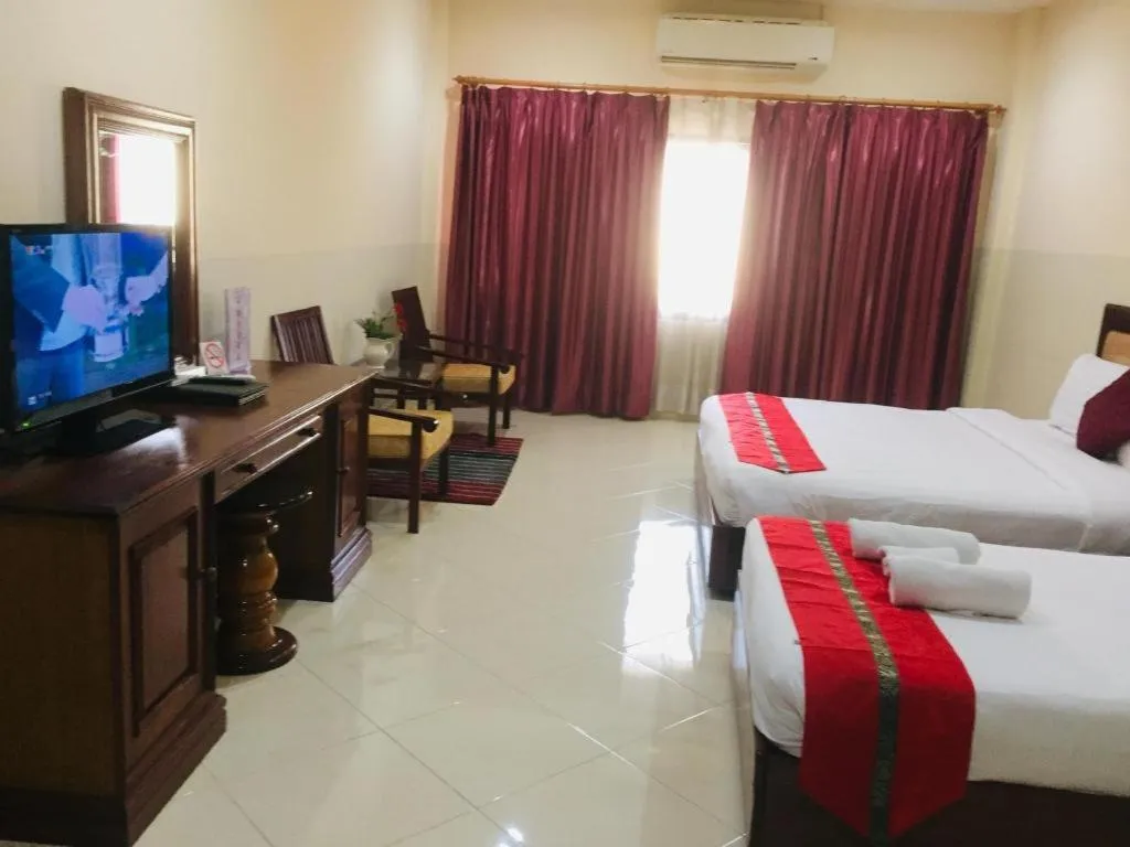 Bed in New Rose Boutique Hotel