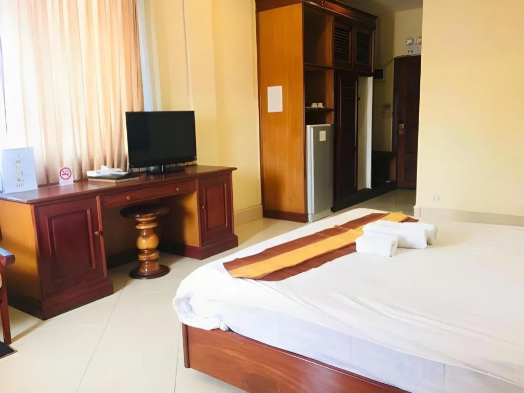 Bed in New Rose Boutique Hotel