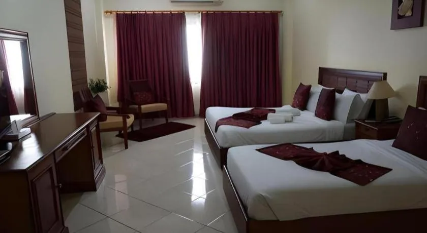 Bed in New Rose Boutique Hotel