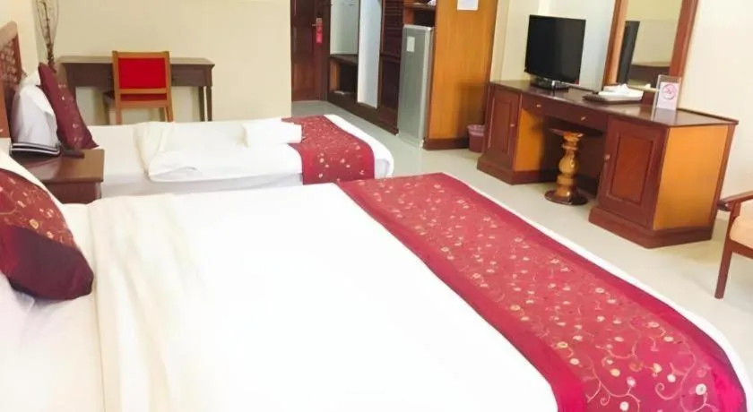 Bed in New Rose Boutique Hotel