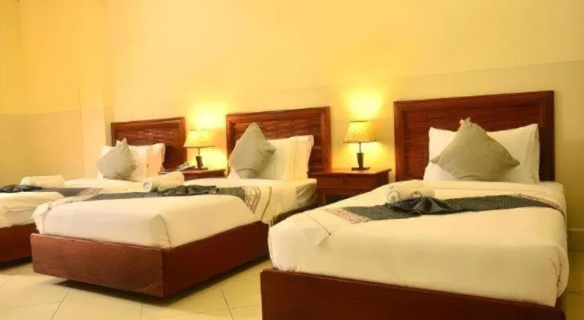 Bed in New Rose Boutique Hotel