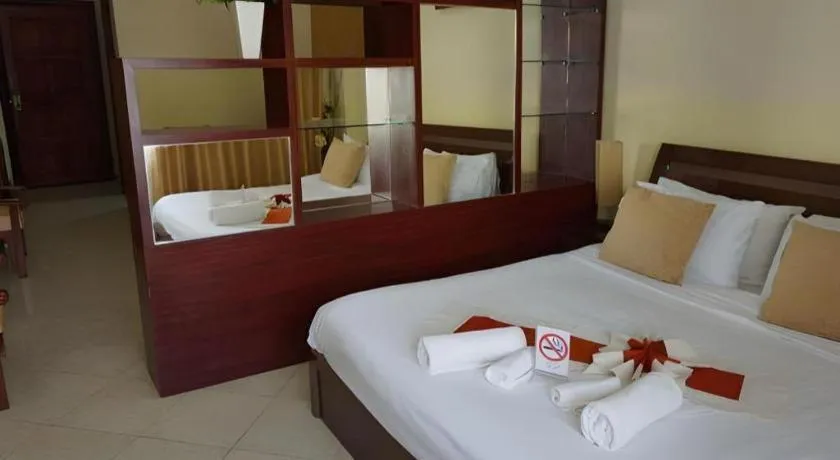 Bed in New Rose Boutique Hotel