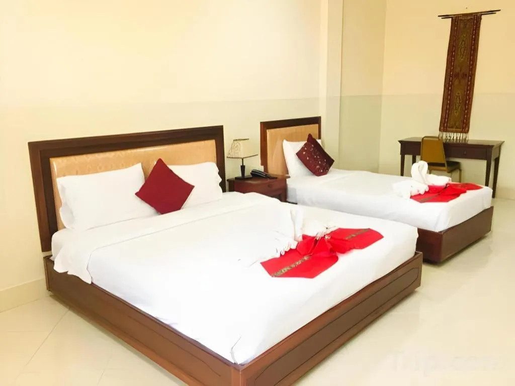 Bed in New Rose Boutique Hotel