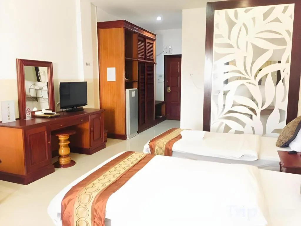 Bed in New Rose Boutique Hotel