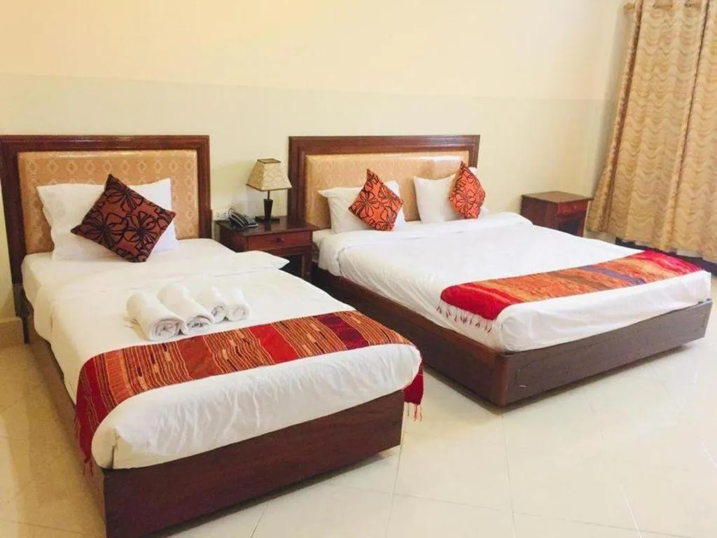 Bed in New Rose Boutique Hotel