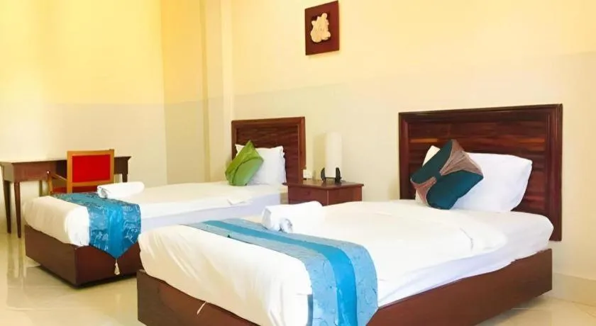 Bed in New Rose Boutique Hotel