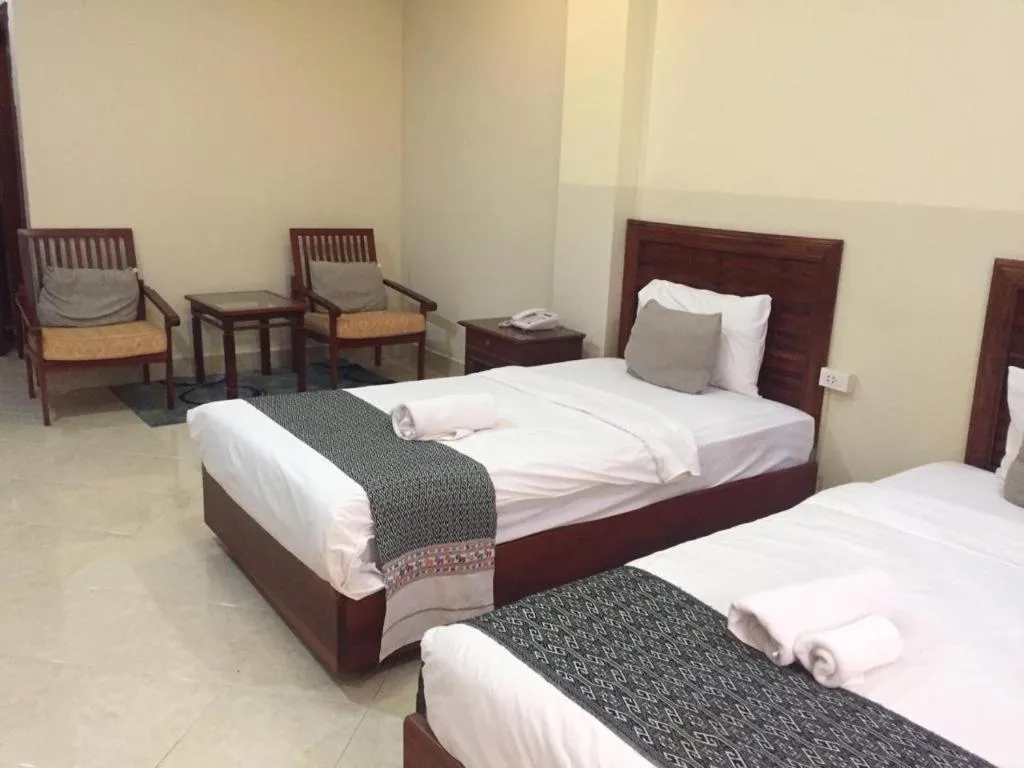 Bed in New Rose Boutique Hotel