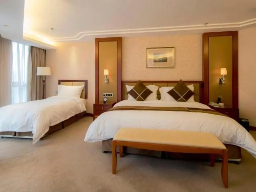 Bed in Xian Qujiang Yinzuo Hotel