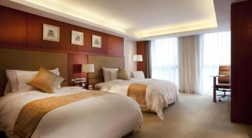 Bed in Xian Qujiang Yinzuo Hotel