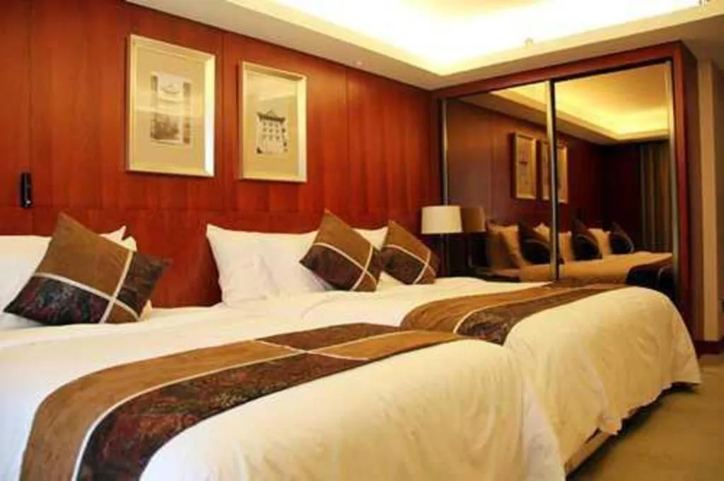 Bed in Xian Qujiang Yinzuo Hotel