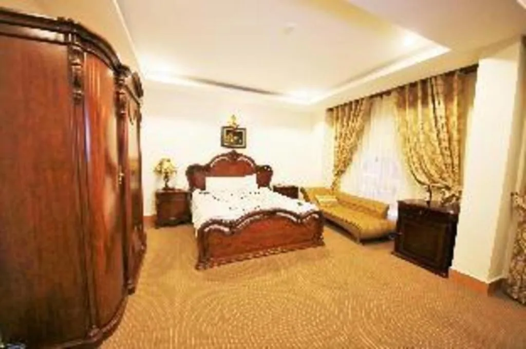 Bed in Marguerite Hotel