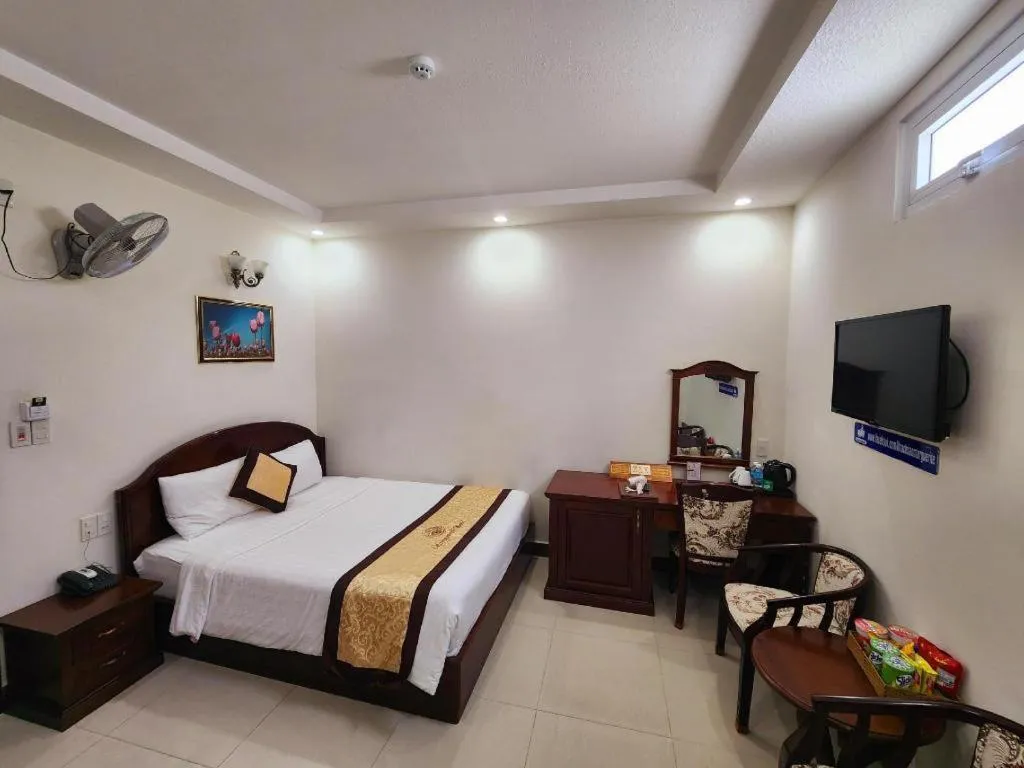 Bed in Marguerite Hotel