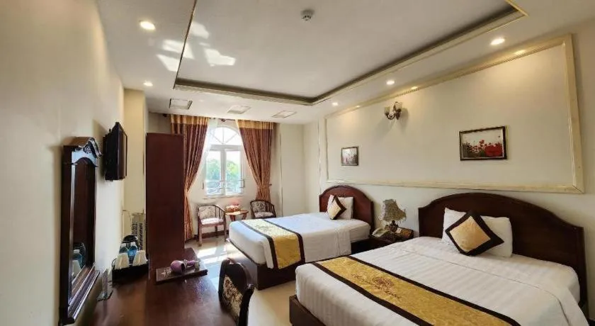 Bed in Marguerite Hotel