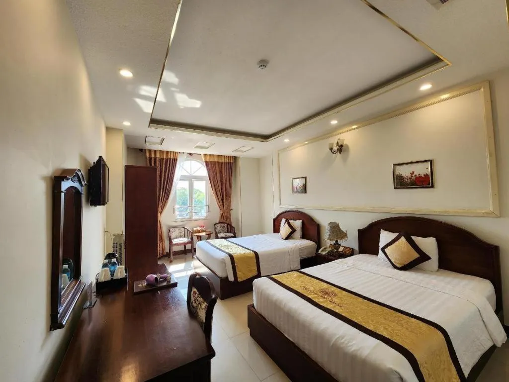 Bed in Marguerite Hotel