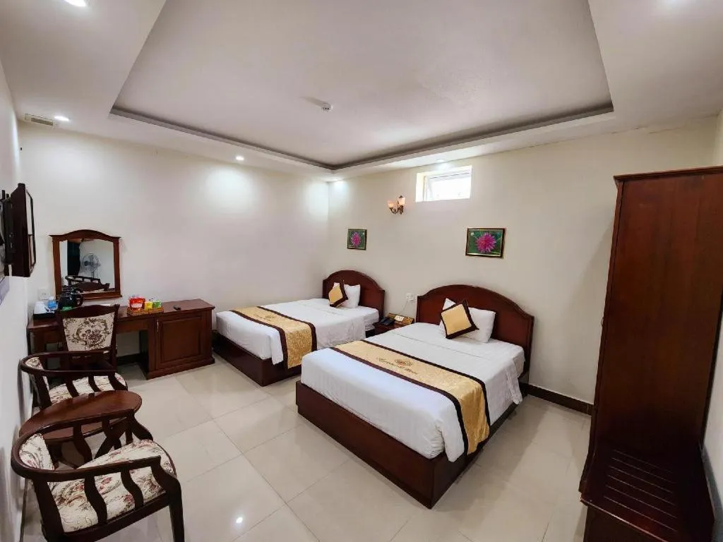 Bed in Marguerite Hotel