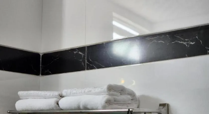 Bed in Marguerite Hotel