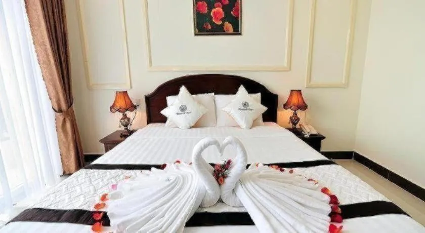 Bed in Marguerite Hotel