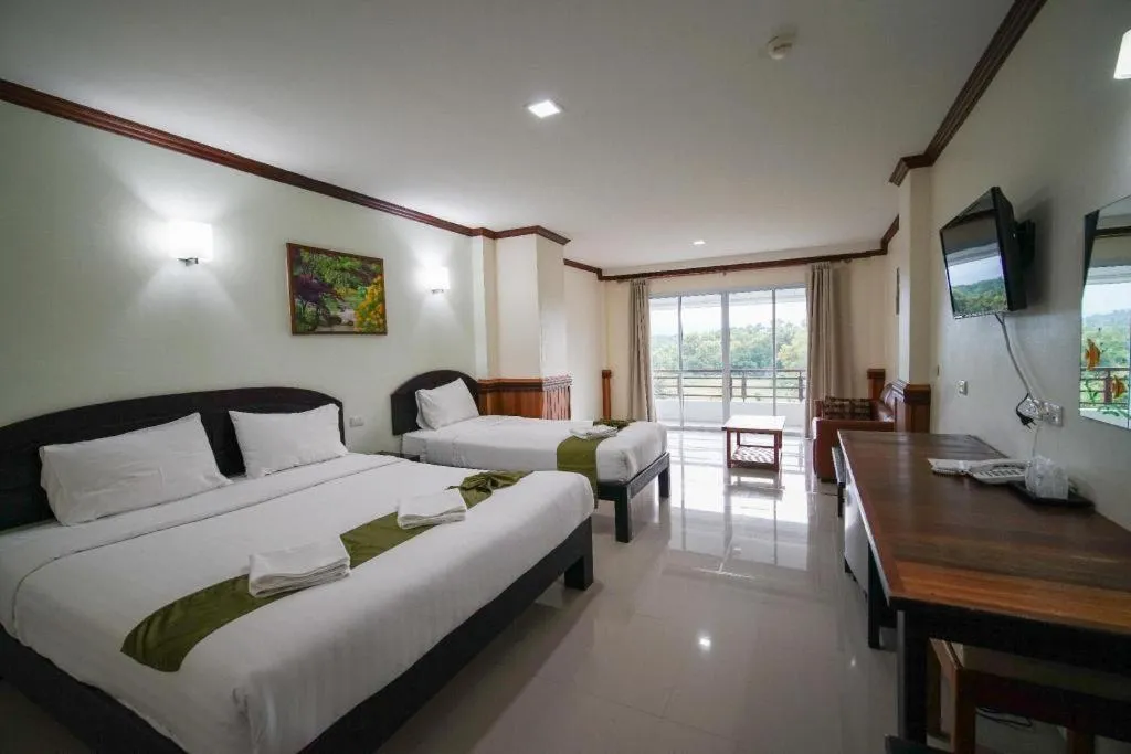 Bed in Sea Mountain Khanom Hotel