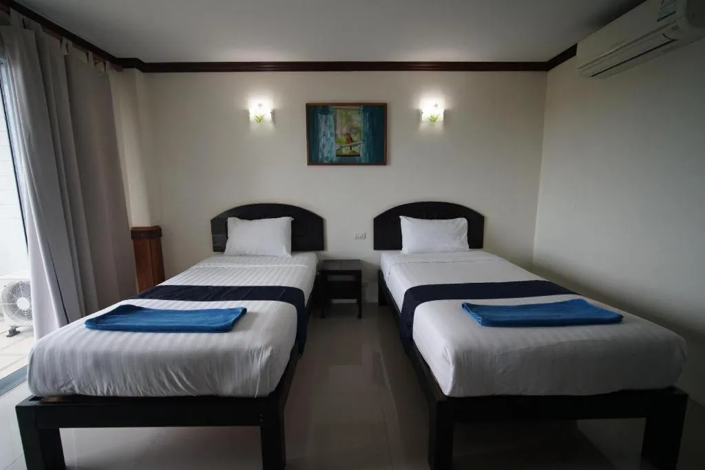 Bed in Sea Mountain Khanom Hotel