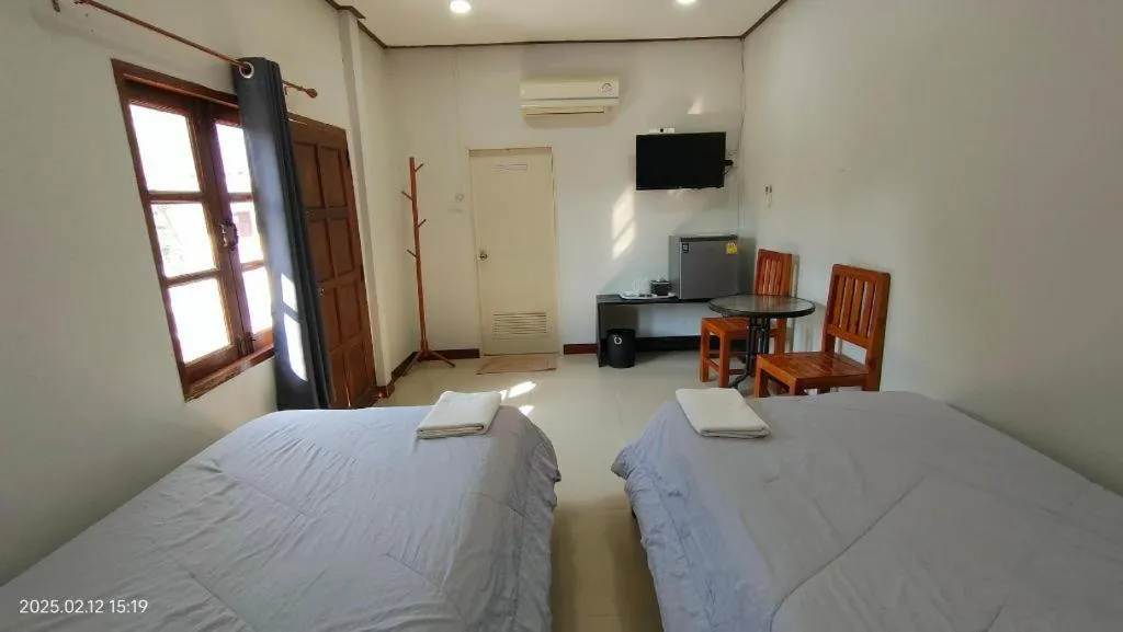 Bed in Suanlamyai Resort