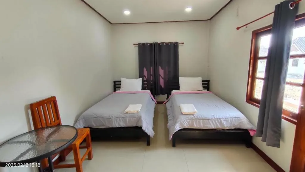 Bed in Suanlamyai Resort