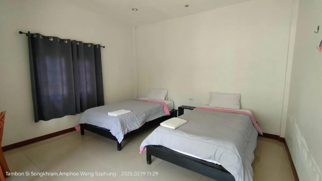 Bed in Suanlamyai Resort