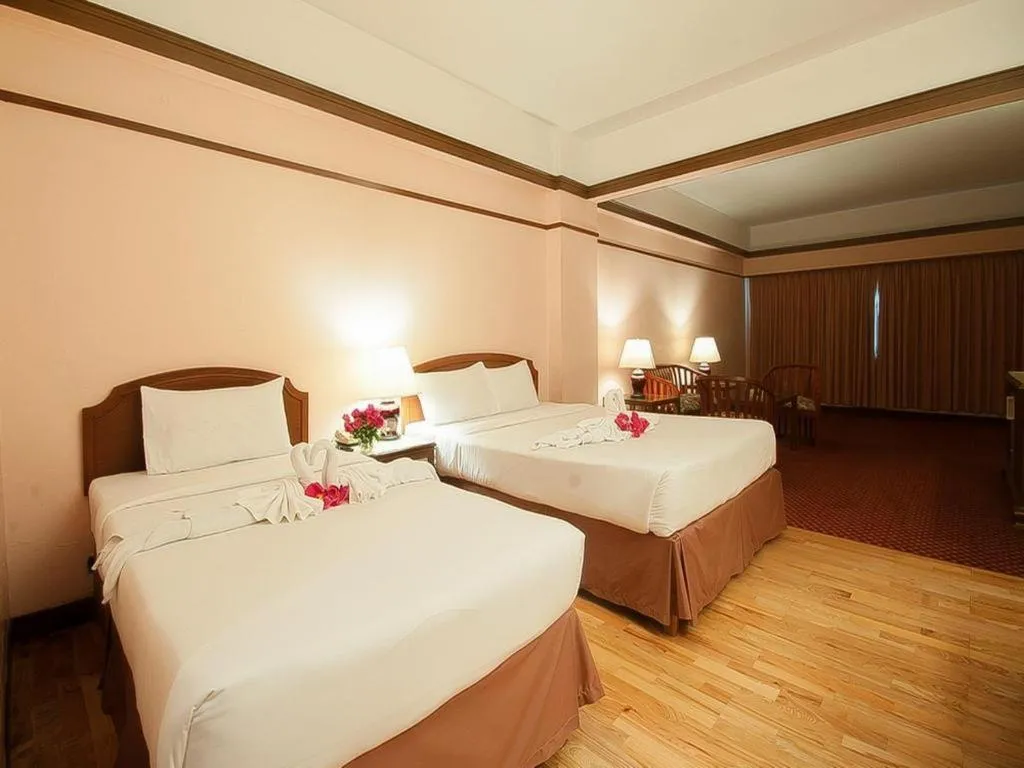 Bed in Grand Plaza Hotel