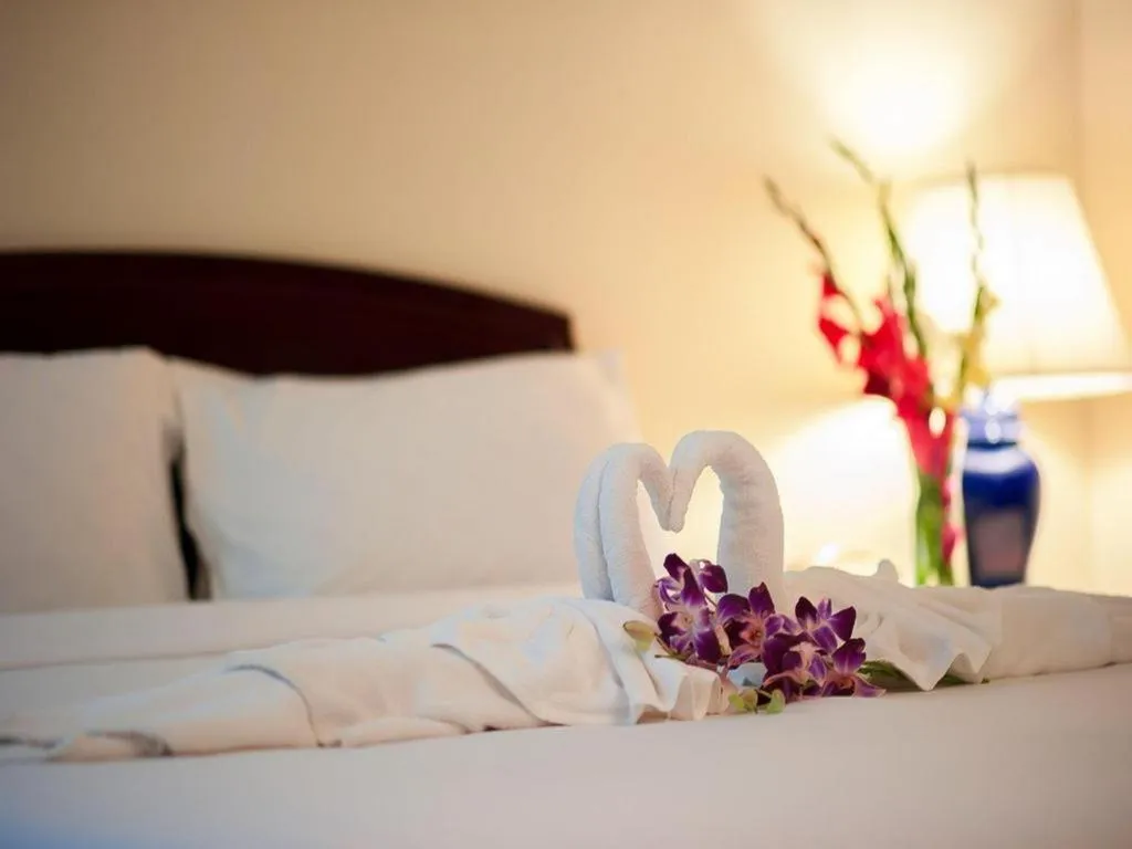 Bed in Grand Plaza Hotel