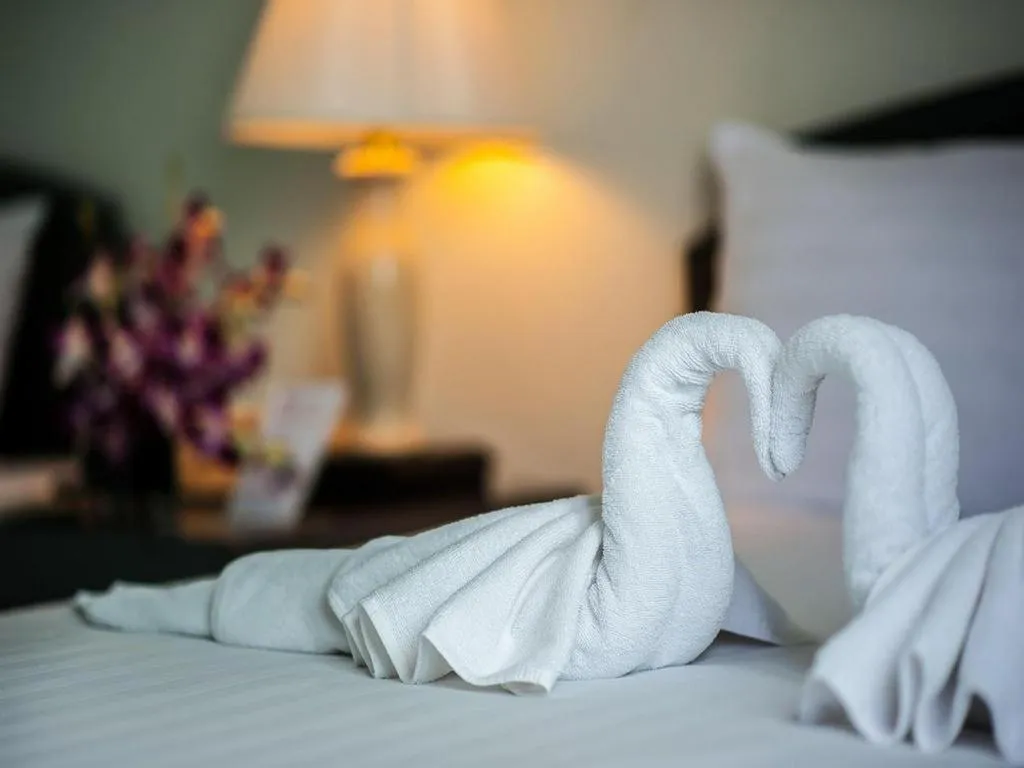 Bed in Grand Plaza Hotel