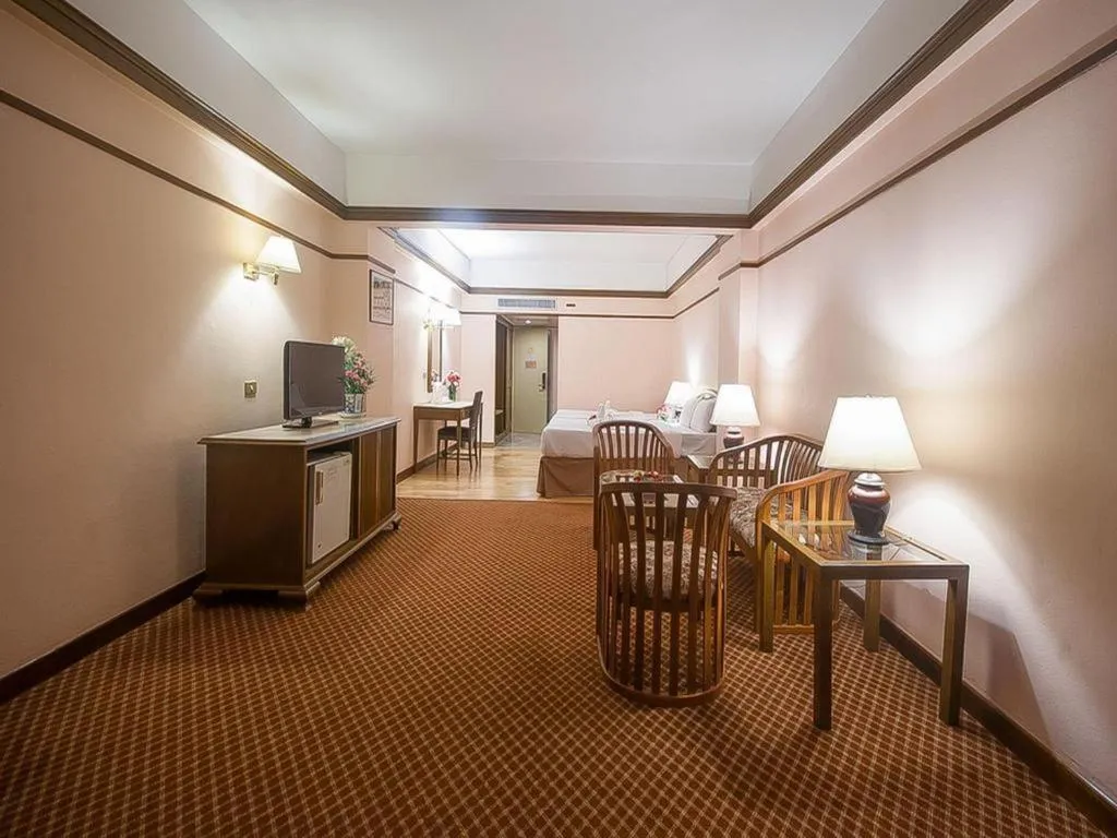 Bed in Grand Plaza Hotel