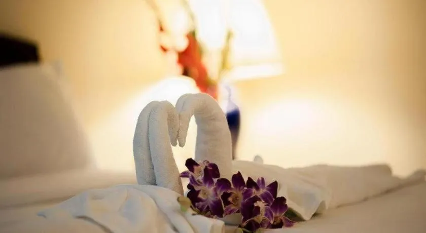 Bed in Grand Plaza Hotel