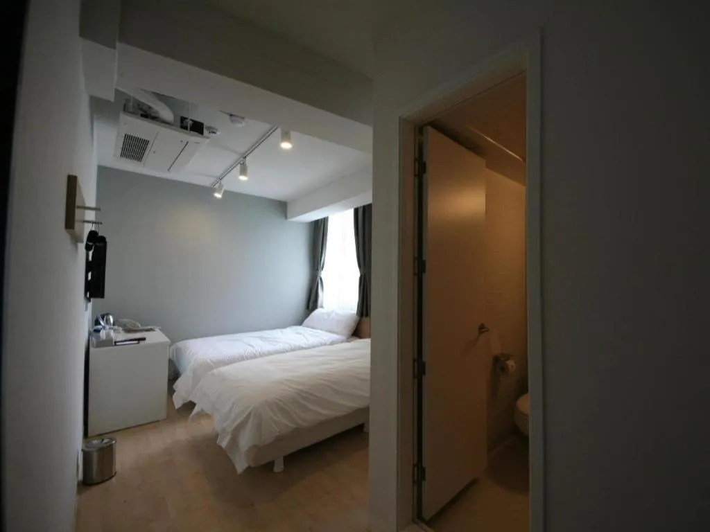 Bed in Wons Ville Myeongdong Hotel