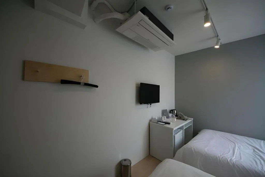 Bed in Wons Ville Myeongdong Hotel