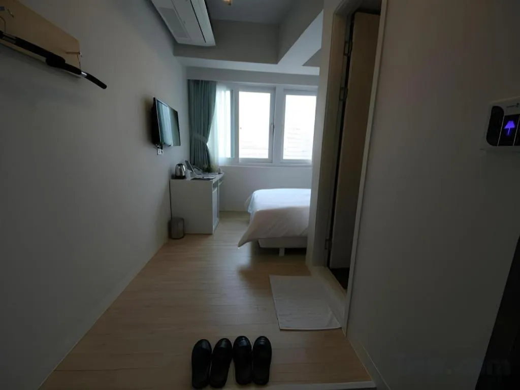 Bed in Wons Ville Myeongdong Hotel