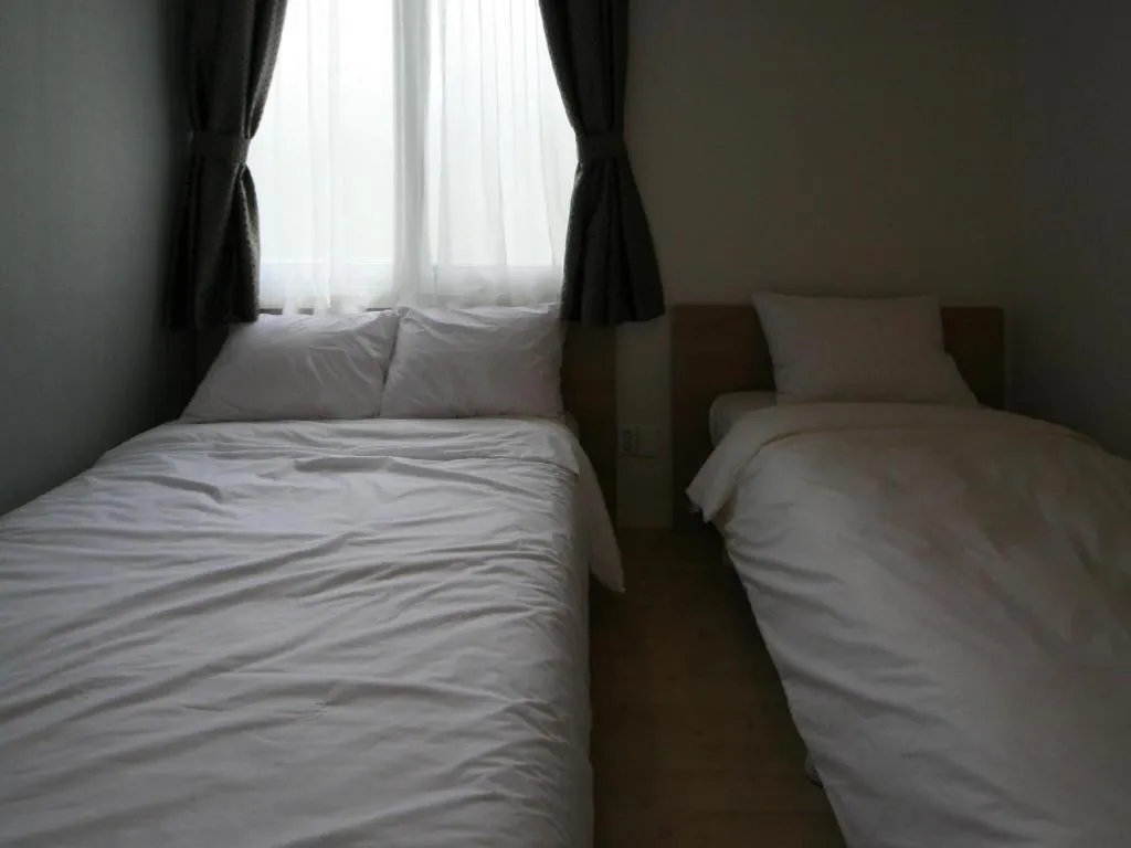 Bed in Wons Ville Myeongdong Hotel