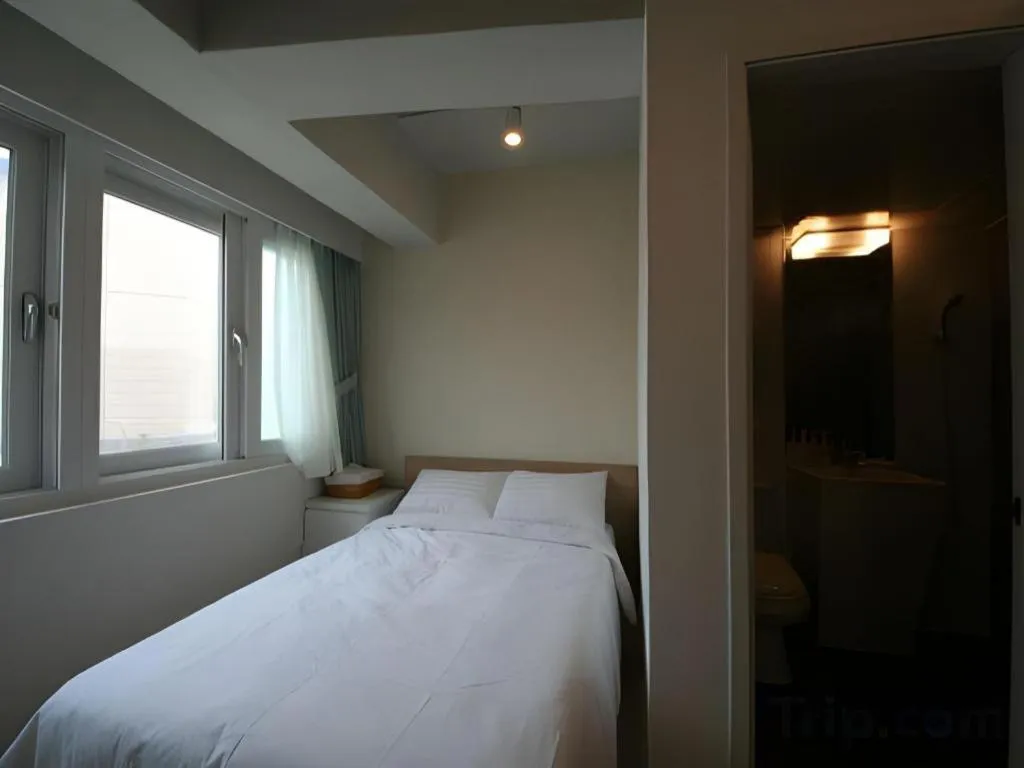 Bed in Wons Ville Myeongdong Hotel