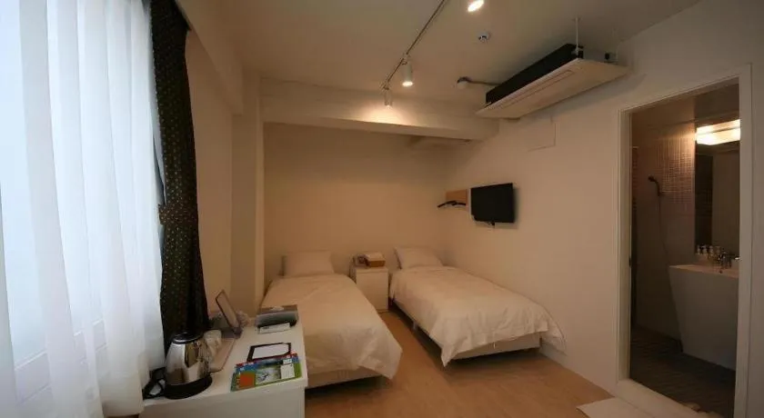 Bed in Wons Ville Myeongdong Hotel