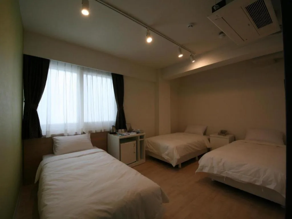 Bed in Wons Ville Myeongdong Hotel