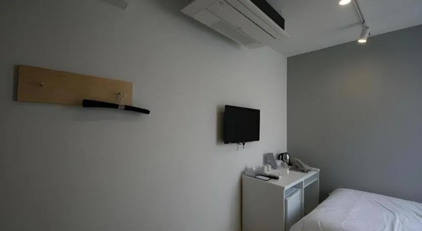 Bed in Wons Ville Myeongdong Hotel