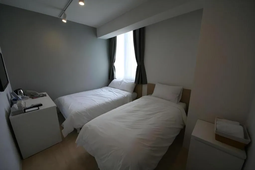 Bed in Wons Ville Myeongdong Hotel