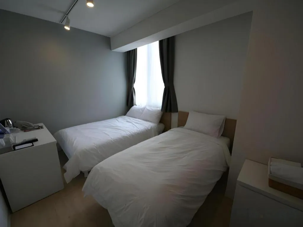 Bed in Wons Ville Myeongdong Hotel