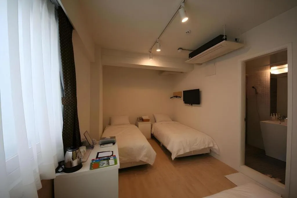 Bed in Wons Ville Myeongdong Hotel