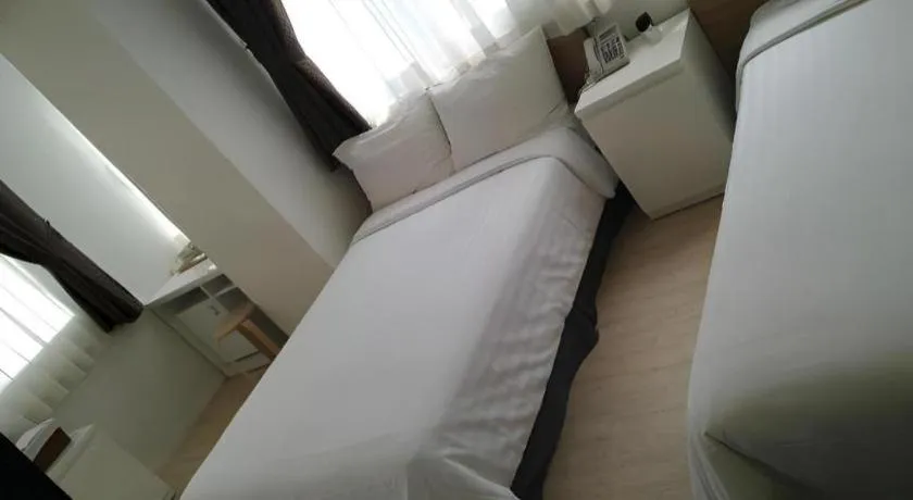 Bed in Wons Ville Myeongdong Hotel
