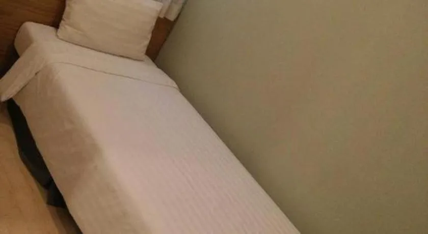 Bed in Wons Ville Myeongdong Hotel