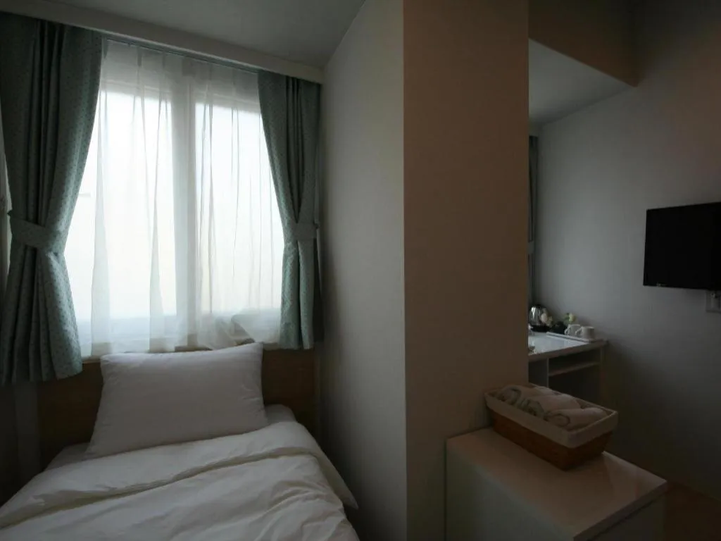 Bed in Wons Ville Myeongdong Hotel