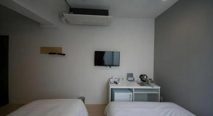 Bed in Wons Ville Myeongdong Hotel