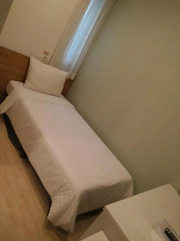 Bed in Wons Ville Myeongdong Hotel