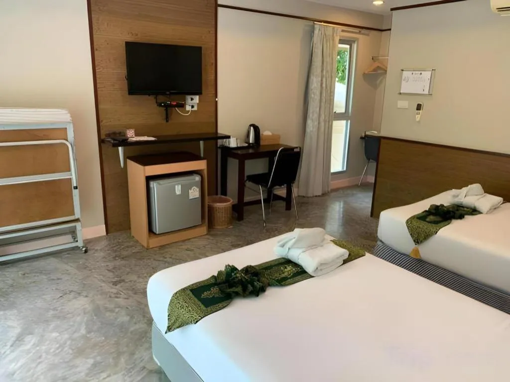 Bed in Nopparat Garden Hotel